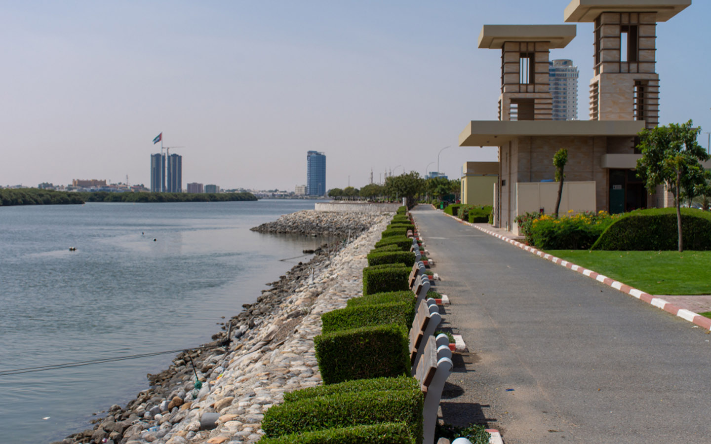 Enjoy the serenity of Al Qawasim Corniche in Ras Al Khaimah, a picturesque waterfront promenade overlooking the Arabian Gulf and mangroves. Take a leisurely stroll along the palm-lined walkway, relax on one of the many benches, or let your kids play on the playground.