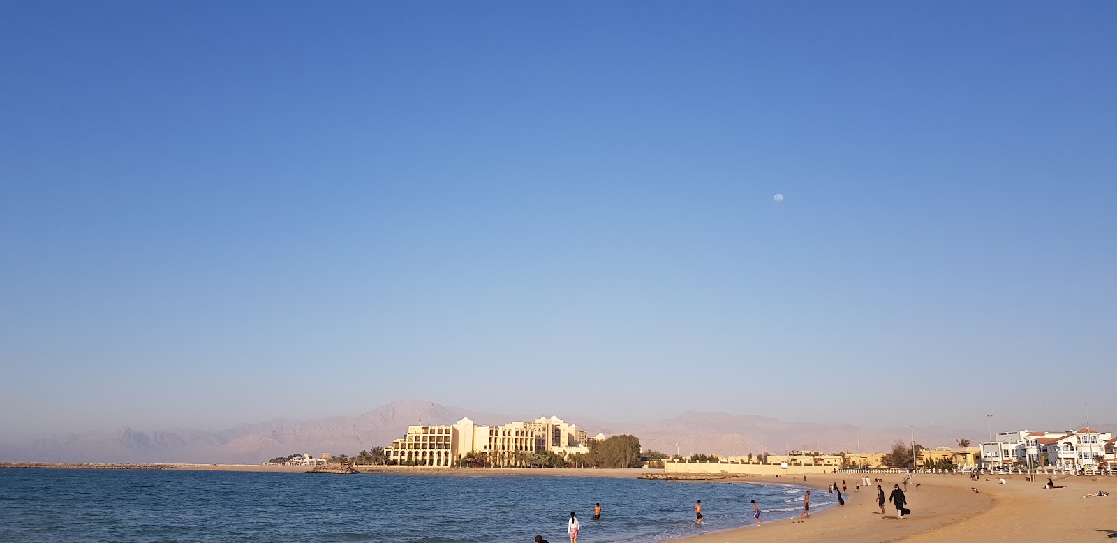 Experience the beauty of Mareedh Beach, Ras Al Khaimah, a serene coastal spot with crystal clear waters, soft sandy shores, and palm trees swaying in the breeze. Perfect for a relaxing getaway or a fun day out with friends and family.